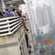 Illustration for article titled Climbing on the Side of a Building To Save a Suicidal Woman